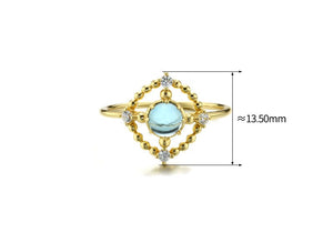 Openwork disc London blue topaz ring