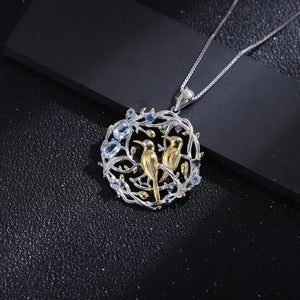 Sky Blue Topaz  with Birds on Openwork Branches Pendant